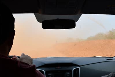 Due from car of dust clouds causing safety hazards