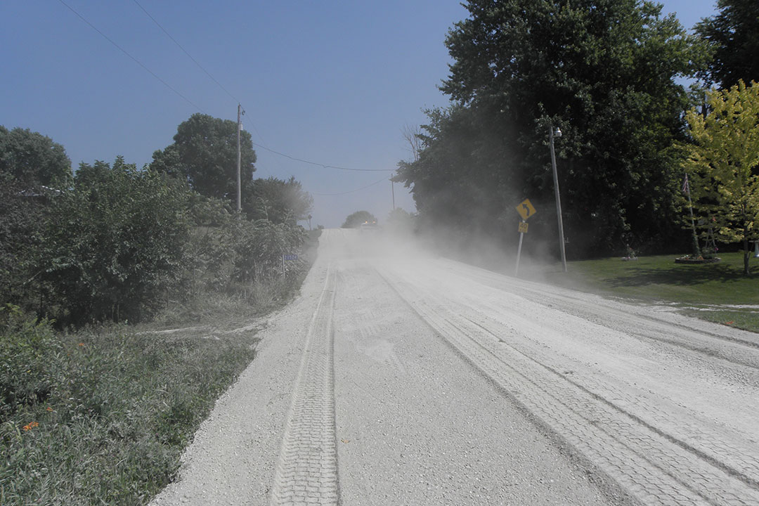 Dust plumes on the road