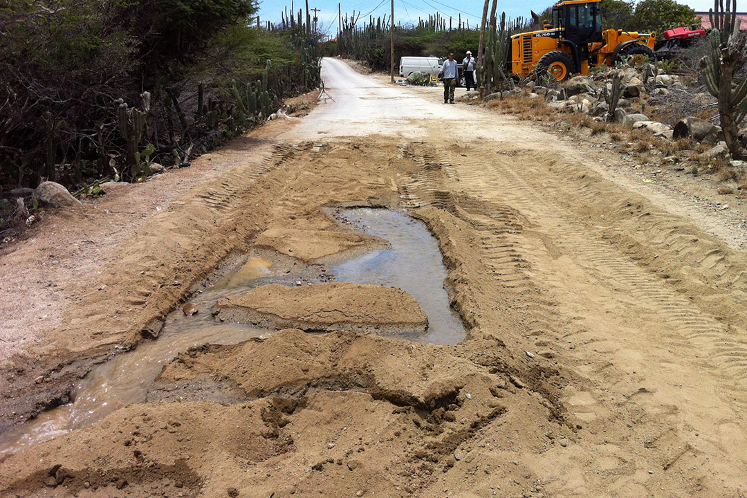 Potholes and severe road damage cause by a high water table