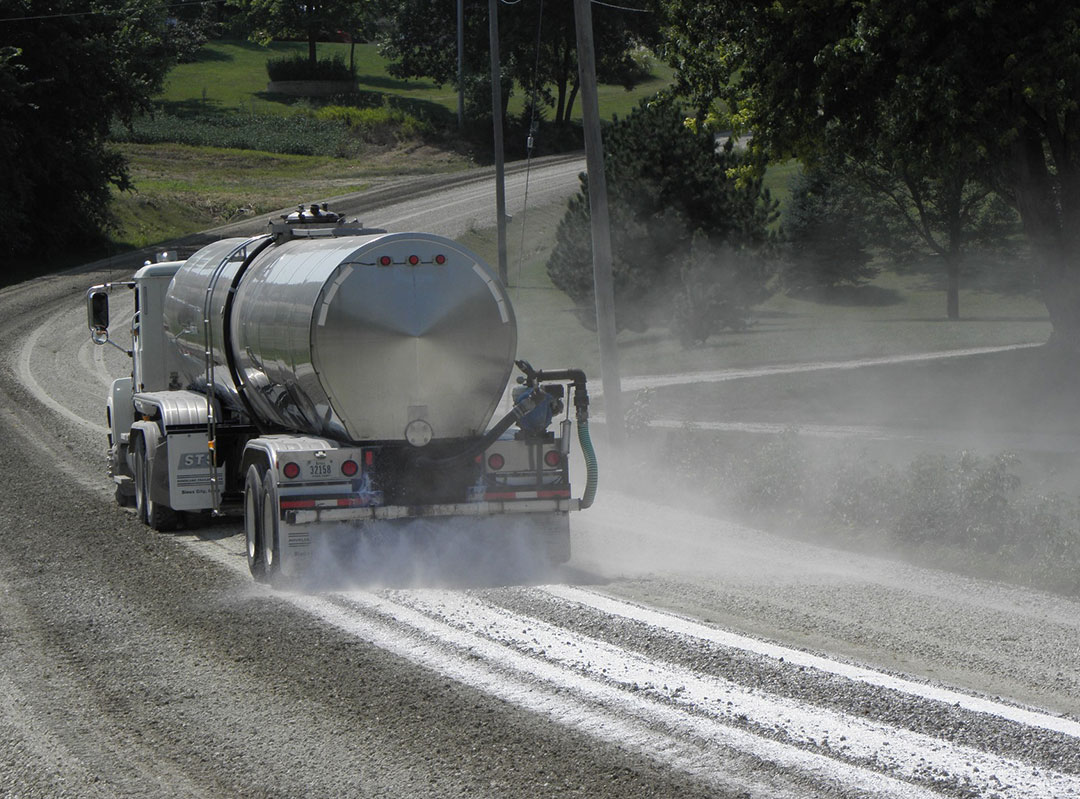 AggreBind sealing gravel road to stop dust