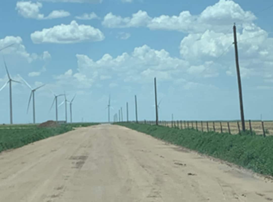 Wind farm access road stabilised with topical treatment of AggreBind