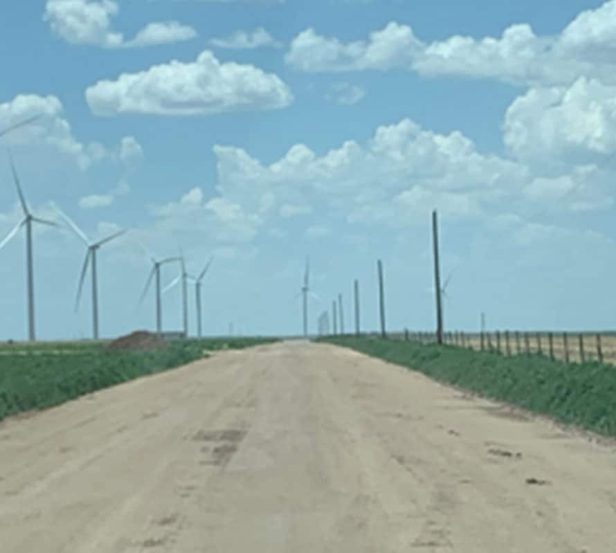 Wind farm access road stabilised with topical treatment of AggreBind