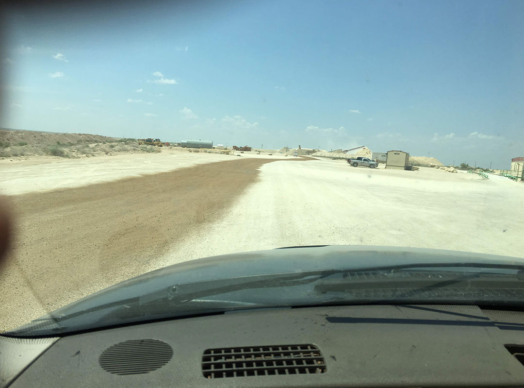 View from a car driving on a mining road in USA AggreBind project