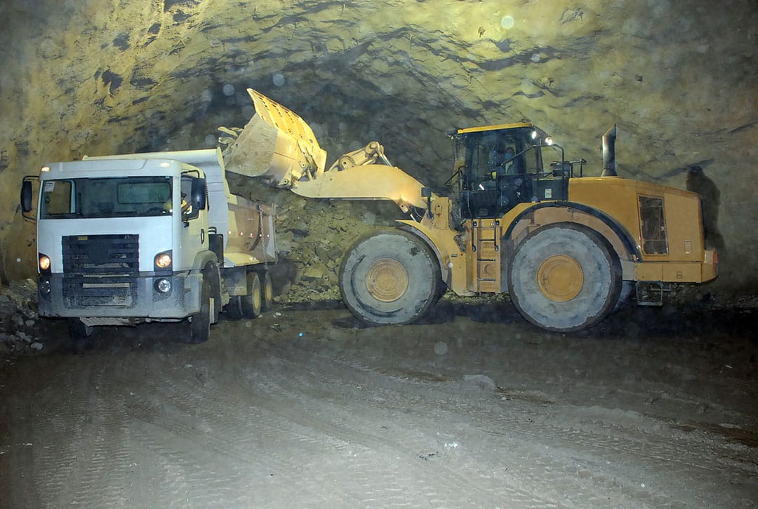 Construction machines digging inside a tunnel