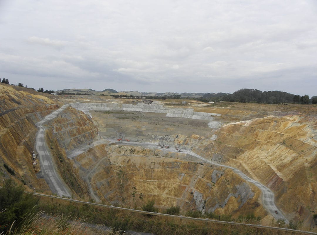 Wide angle of open cut mine in Oceania for AggreBind road project